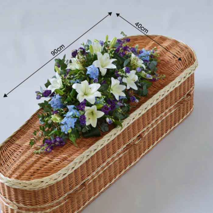 ‘The Flower Shop Helensburgh - Blue And White Casket Spray’