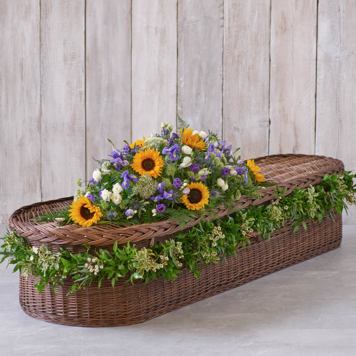 ‘The Flower Shop Helensburgh - Sunflower Mix Casket Spray With Garland’