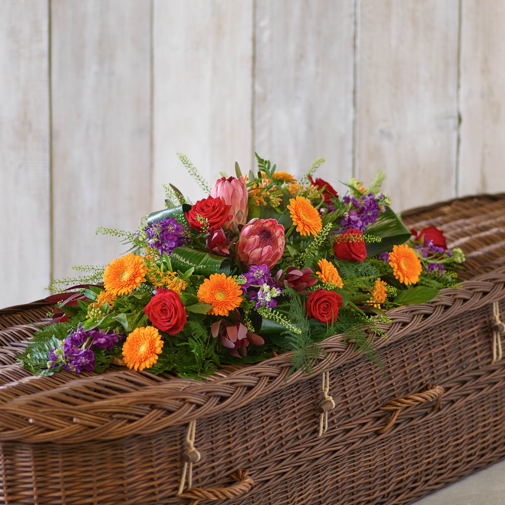 ‘The Flower Shop Helensburgh - Tropical Casket Spray’