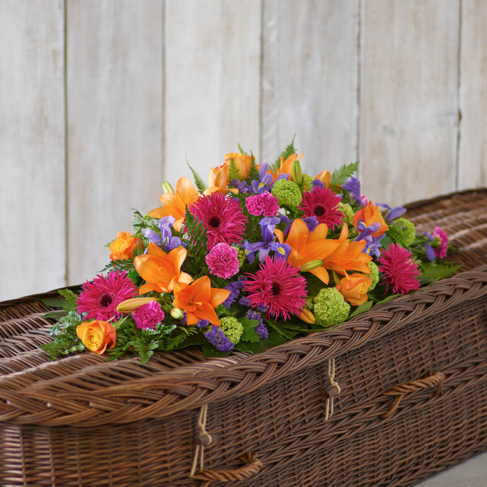 ‘The Flower Shop Helensburgh - Vibrant Casket Spray’